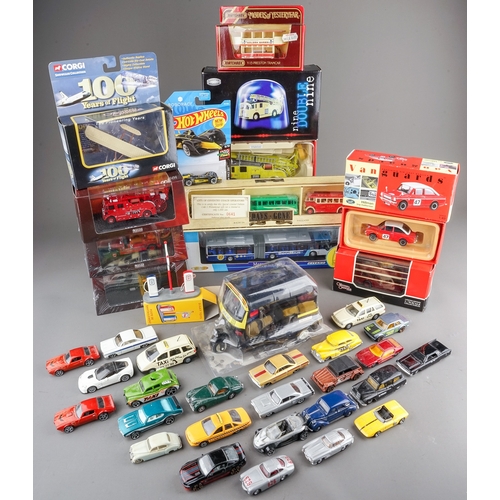 298 - Assorted loose die cast model cars mainly Matchbox together with boxed fire engines, buses, a Vangua... 