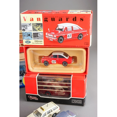 298 - Assorted loose die cast model cars mainly Matchbox together with boxed fire engines, buses, a Vangua... 