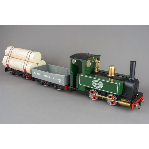 303 - A boxed The Mamod Live Steam Railway Company Goods Train Set comprising:  SL1 Tank locomotive, a red... 