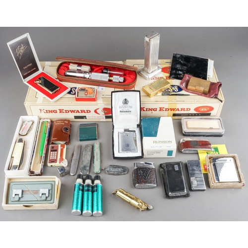 308 - 2 boxes - one with lighters, other with pocket knives and pipe cleaners (2)