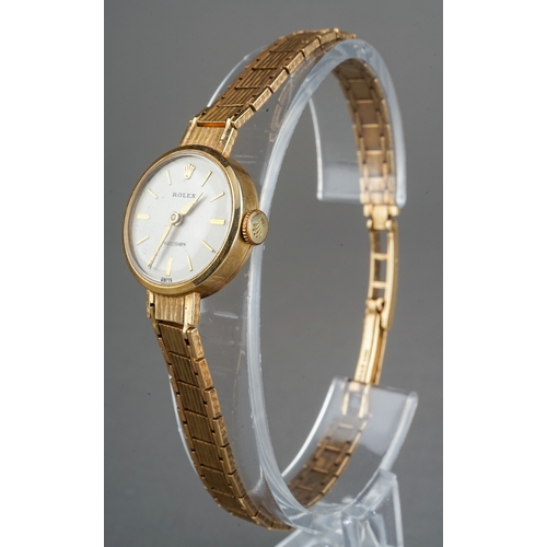 310 - Rolex - a ladies 9ct yellow gold Rolex Precision wristwatch, 17mm circular dial, integral gold brace... 