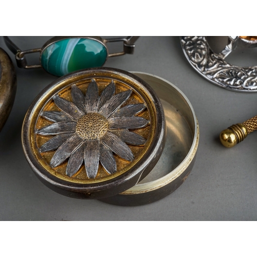 311 - A circular silver pill box, the cover decorated in relief with a sunflower, gilt highlights, Peter N... 