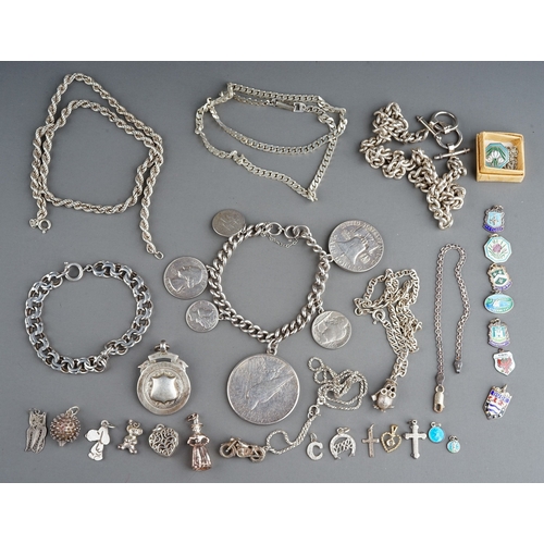 314 - A collection of silver and white metal jewellery, including chains, fobs, a curb-link bracelet set w... 