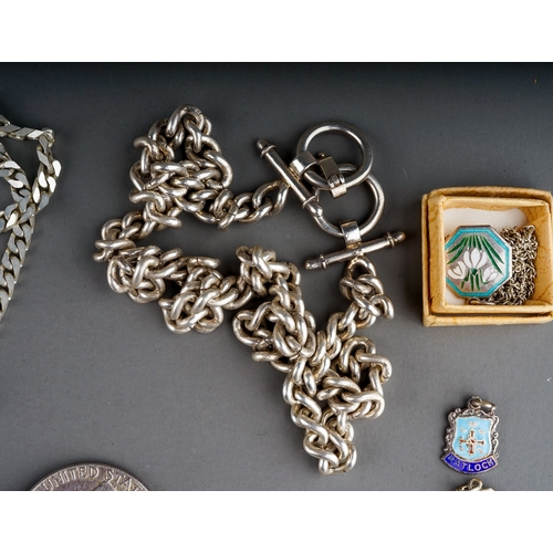 314 - A collection of silver and white metal jewellery, including chains, fobs, a curb-link bracelet set w... 