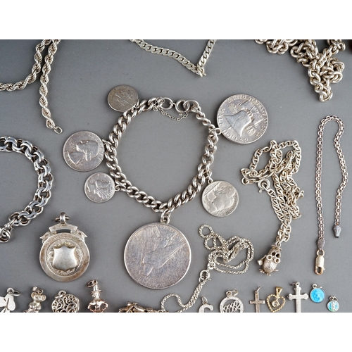 314 - A collection of silver and white metal jewellery, including chains, fobs, a curb-link bracelet set w... 