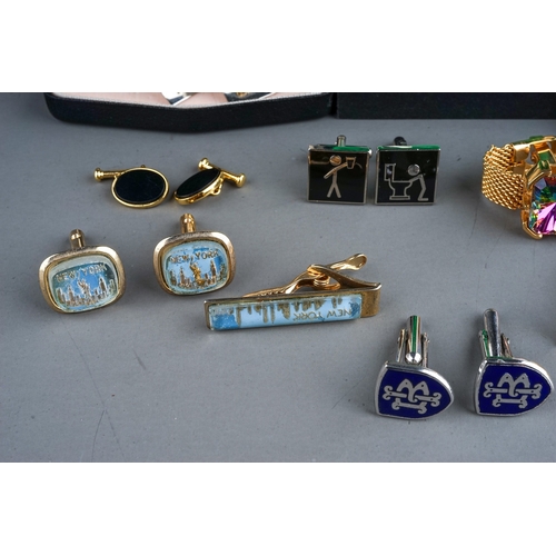 321 - A collection of cufflinks, including gold plated, dart boards, enamelled, 1970's, Wedgwood silver an... 