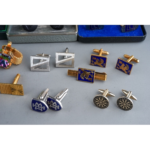 321 - A collection of cufflinks, including gold plated, dart boards, enamelled, 1970's, Wedgwood silver an... 