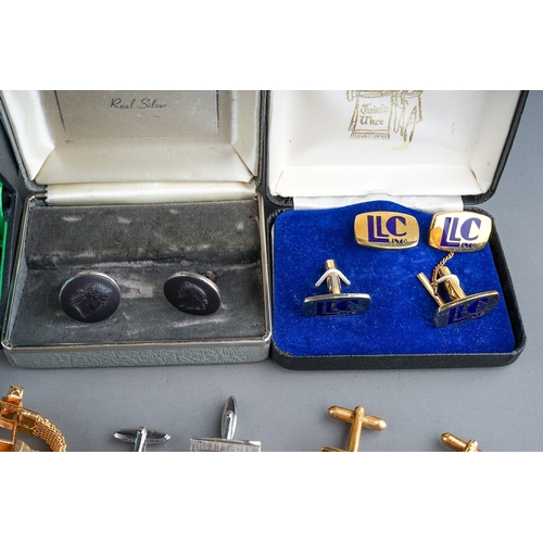 321 - A collection of cufflinks, including gold plated, dart boards, enamelled, 1970's, Wedgwood silver an... 