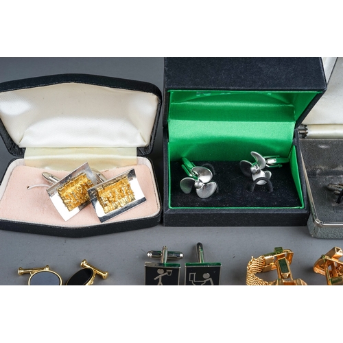 321 - A collection of cufflinks, including gold plated, dart boards, enamelled, 1970's, Wedgwood silver an... 