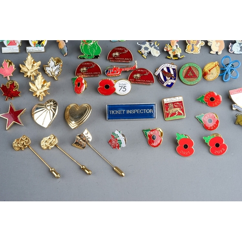 325 - A large collection of vintage and modern novelty metal and enamel lapel badges to include: Euro Disn... 