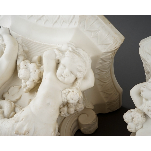 329 - A pair of Copeland Parian wall brackets, shaped tops above volute scrolls and putti with swags of fr... 