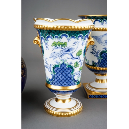 332 - A set of three early 20th Century Royal Crown Derby table garnitures decorated with Chinese pheasant... 