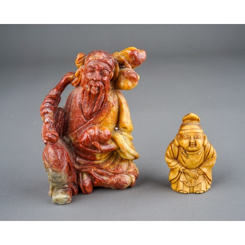 342 - A Chinese carved hardstone figure of an elderly man with fruit and a vintage resin Netske of a man h... 