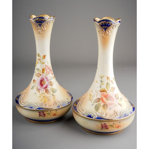 354 - Wiltshaw & Robinson (Stoke-on-Trent): A pair of Carlton Ware vases, blush ivory painted with flowers... 