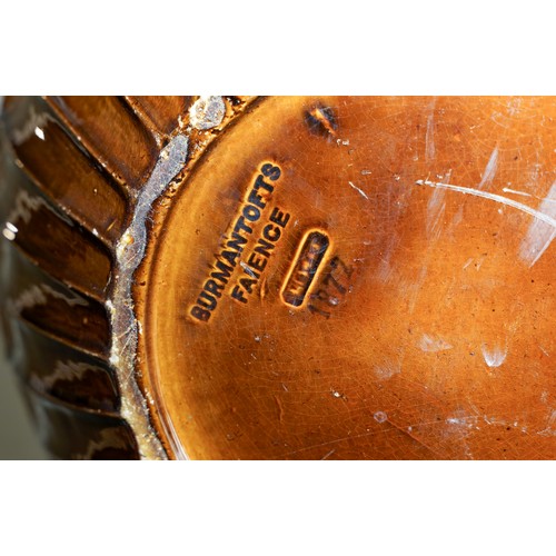 401 - A late Victorian Burmantofts monumental earthenware amber glazed jardiniere on stand, the large bowl... 