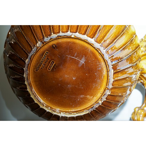 401 - A late Victorian Burmantofts monumental earthenware amber glazed jardiniere on stand, the large bowl... 