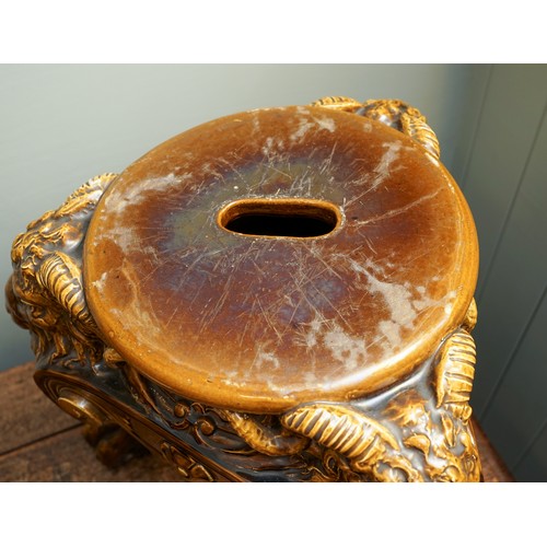 401 - A late Victorian Burmantofts monumental earthenware amber glazed jardiniere on stand, the large bowl... 