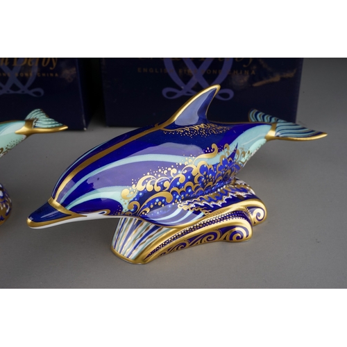 407 - Two Royal Crown Derby paperweights to include: Bottlenose Dolphin, gold stopper, red backstamp, date... 