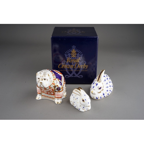 408 - Three Royal Crown Derby paperweights to include: British Bulldog, gilt stopper, red back stamp, date... 