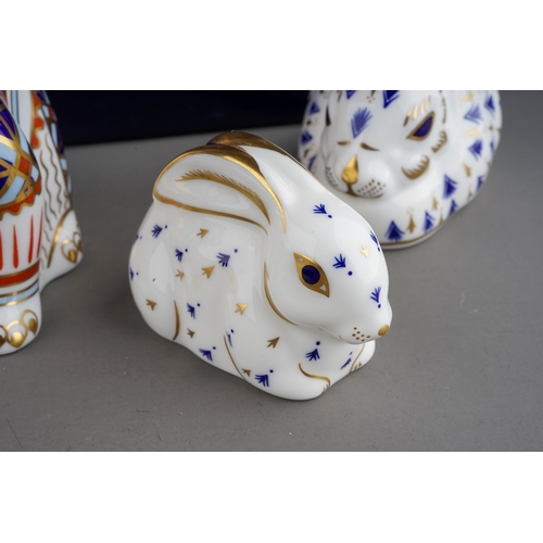 408 - Three Royal Crown Derby paperweights to include: British Bulldog, gilt stopper, red back stamp, date... 