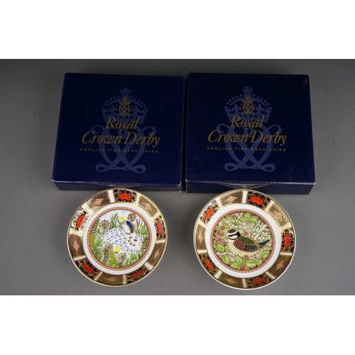 411 - Two Royal Crown Derby dishes including: The 1998 Year Tray Blue Tit and The 1999 Year Tray Rabbit, b... 