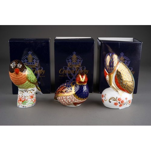 412 - Three Royal Crown Derby paperweights to include: Limited Edition Partridge, numbered 3303/4500, gilt... 