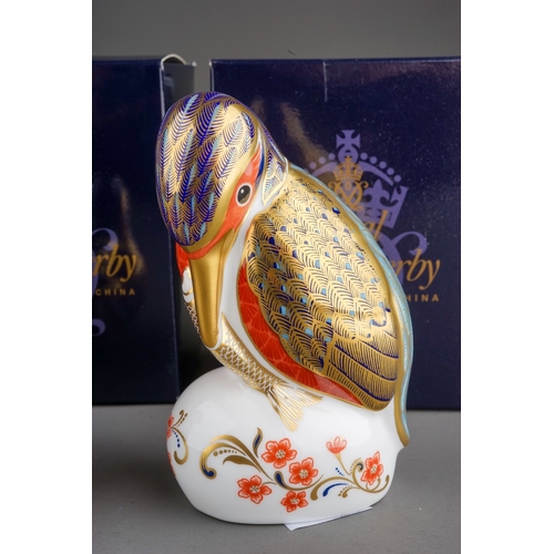 412 - Three Royal Crown Derby paperweights to include: Limited Edition Partridge, numbered 3303/4500, gilt... 