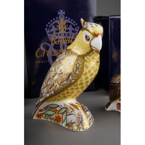 415 - Four Royal Crown Derby paperweights to include: Rockhopper Penguin, gold stopper, red backstamp, box... 