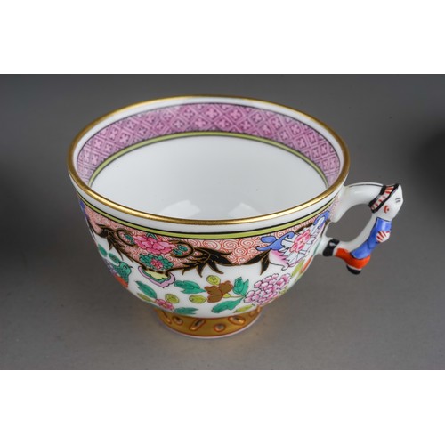 461 - Two Herend Chinoiserie coffee cups and saucers, one with blue ground decorated with three fish and f... 