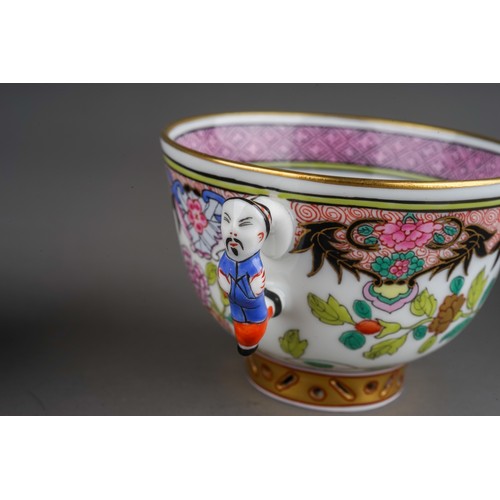 461 - Two Herend Chinoiserie coffee cups and saucers, one with blue ground decorated with three fish and f... 