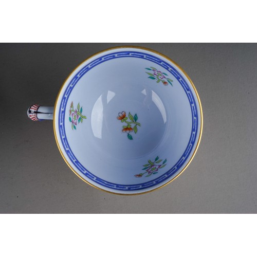 461 - Two Herend Chinoiserie coffee cups and saucers, one with blue ground decorated with three fish and f... 