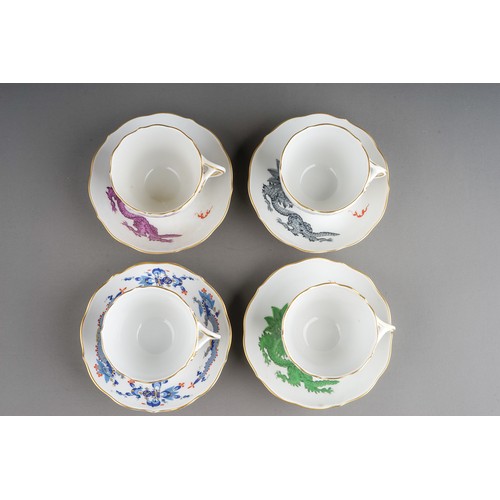 469 - A set of three Meissen Chinoiserie Dragon coffee cups and saucers, each cup with wavy rim and gilt h... 