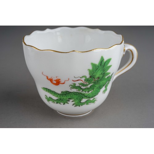 469 - A set of three Meissen Chinoiserie Dragon coffee cups and saucers, each cup with wavy rim and gilt h... 