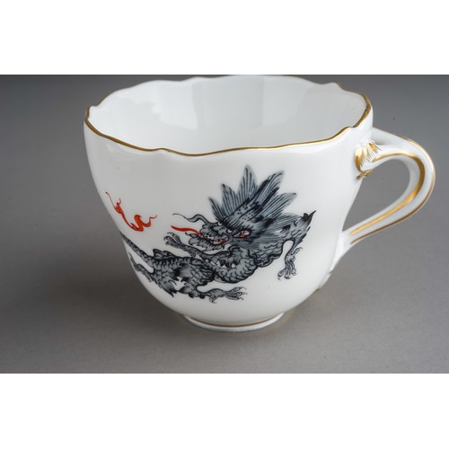 469 - A set of three Meissen Chinoiserie Dragon coffee cups and saucers, each cup with wavy rim and gilt h... 