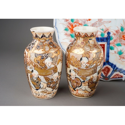 477 - Two Chinese Imari scalloped dishes, one decorated with lion jumping on a balcony, the other with flo... 