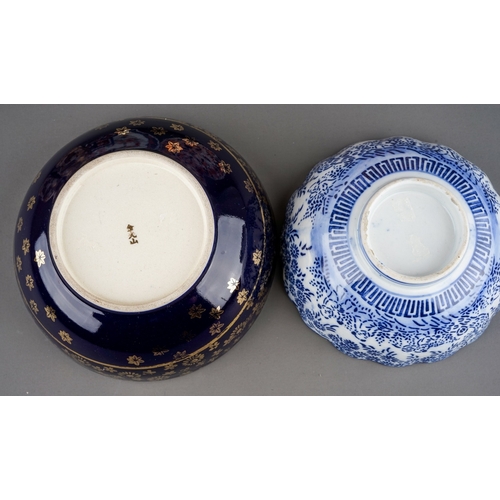 477 - Two Chinese Imari scalloped dishes, one decorated with lion jumping on a balcony, the other with flo... 