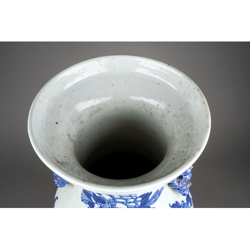 480 - A Chinese blue and white baluster vase decorated with central four claw dragon hiding amongst flower... 