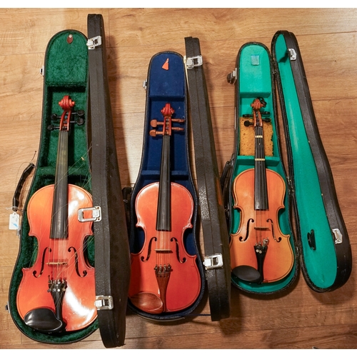 490 - Three various violins to include: 

1 Lark: a 20th Century Child's violin musical instrument labelle... 