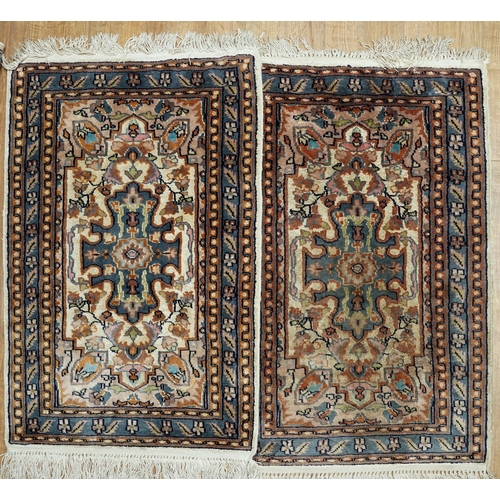 496 - A near pair of Persian wood prayer rugs with central quatrefoil motifs, approx 96 x 63cm (2)