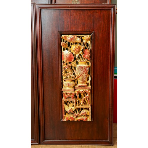 497 - A set of 4 Chinese Four season carved giltwood panels depicting vases of flowers, tables, rabbits an... 