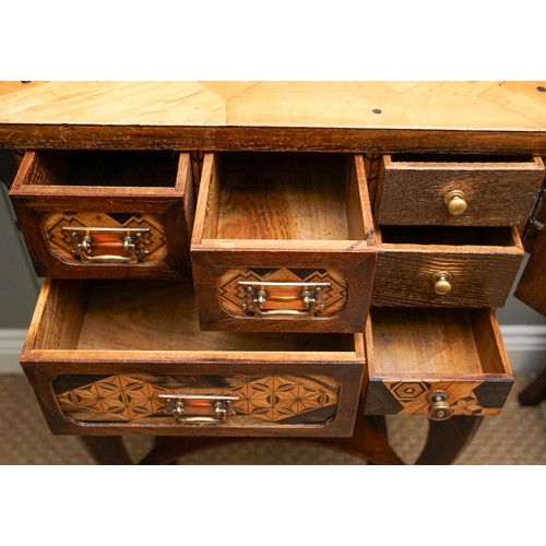 526 - A Japanese Meiji period parquetry cabinet on stand, the double hinged cover opens to reveal geometri... 