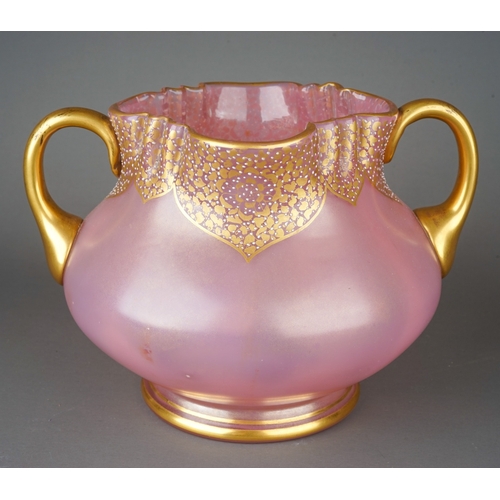 558 - Pink bohemian two handled glass vase with gilt and jewelled detailing, possibly by Lertz. Approx14 c... 