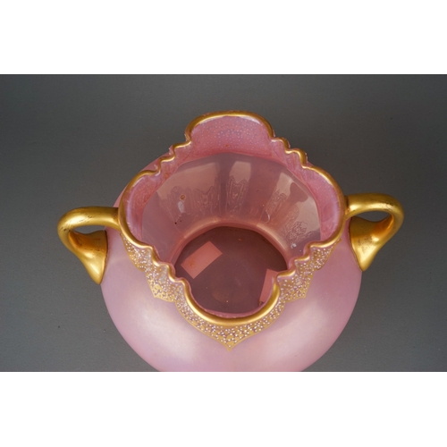 558 - Pink bohemian two handled glass vase with gilt and jewelled detailing, possibly by Lertz. Approx14 c... 