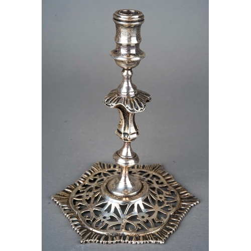 566 - A late Victorian silver taperstick, on hexagonal reticulated base, hallmarked by B.D., London, 1898,... 