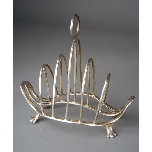 568 - A George V silver five bar toast rack, loop handle on four paw feet, hallmarked by Roberts & Belk, S... 