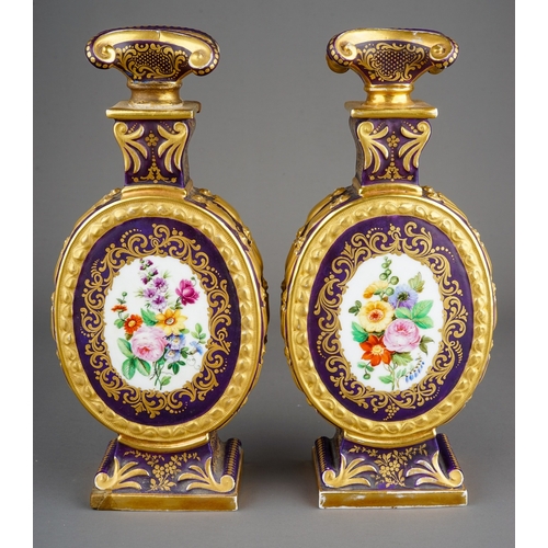 330A - A pair of 19th Century French probably Paris porcelain large scent bottles with stoppers, green grou...