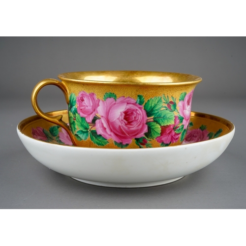 329A - A 19th Century Meissen porcelain breakfast cup and saucer, the entire decorated with pink roses on g... 