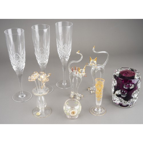 505A - Glassware to include: three cut glass Champagne flutes; a pair of Murano style cats; a Suffolk glass... 