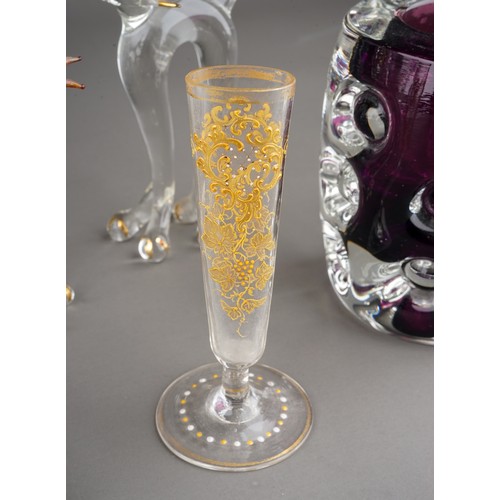 505A - Glassware to include: three cut glass Champagne flutes; a pair of Murano style cats; a Suffolk glass... 