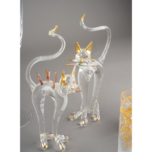 505A - Glassware to include: three cut glass Champagne flutes; a pair of Murano style cats; a Suffolk glass... 